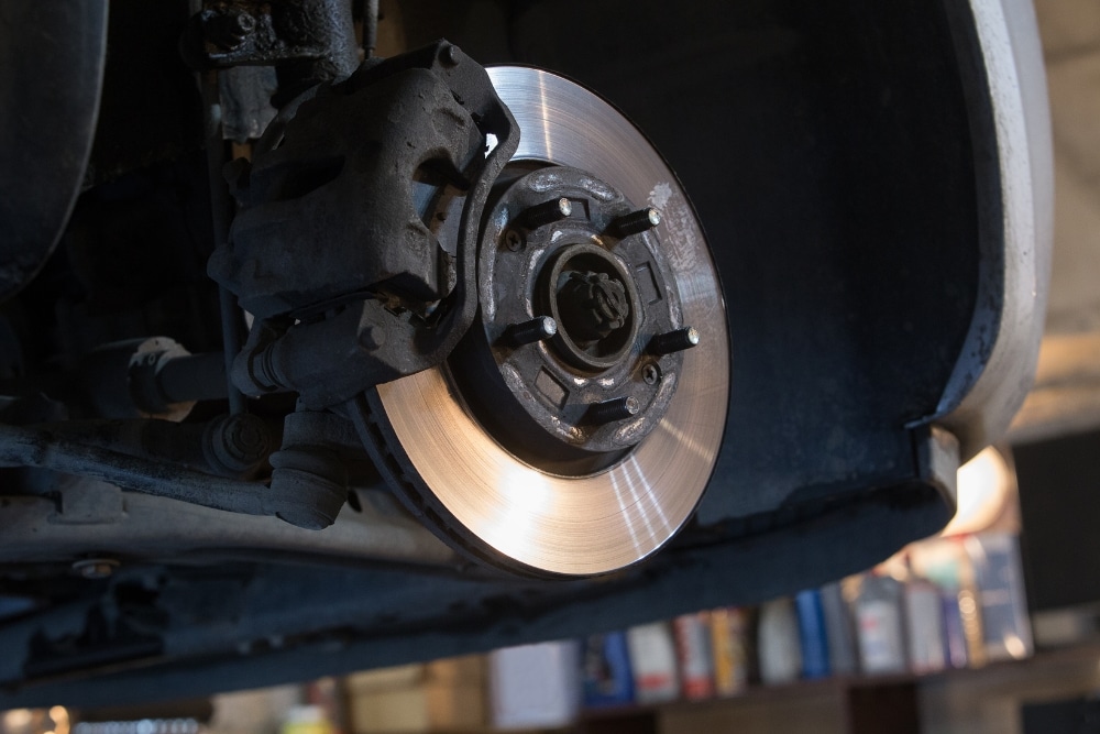 BMW Brake Repair in Jacksonville FL At Mack Motorwerks. Close-up of BMW brake system in auto repair shop