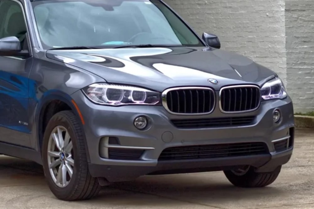 Spring European Car Service, BMW Repair in Jacksonville, FL At Mack Motorwerks. BMW parked outside for spring maintenance